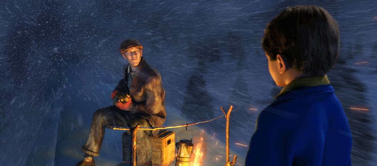 Auf dem Dach vom Polarexpress lernt der kleine Junge einen Mann kennen, der ihm erzählt, dass er der Herr über den Nordpol ist ... - Bildquelle: Warner Bros. Pictures