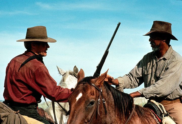 Noch einmal geht der frühere Revolverheld Bill Munny (Clint Eastwood, l.), zusammen mit seinem Freund Ned Logan (Morgan Freeman, r.), auf die Jagd n... - Bildquelle: 1992 Warner Bros. Entertainment Inc. All rights reserved.