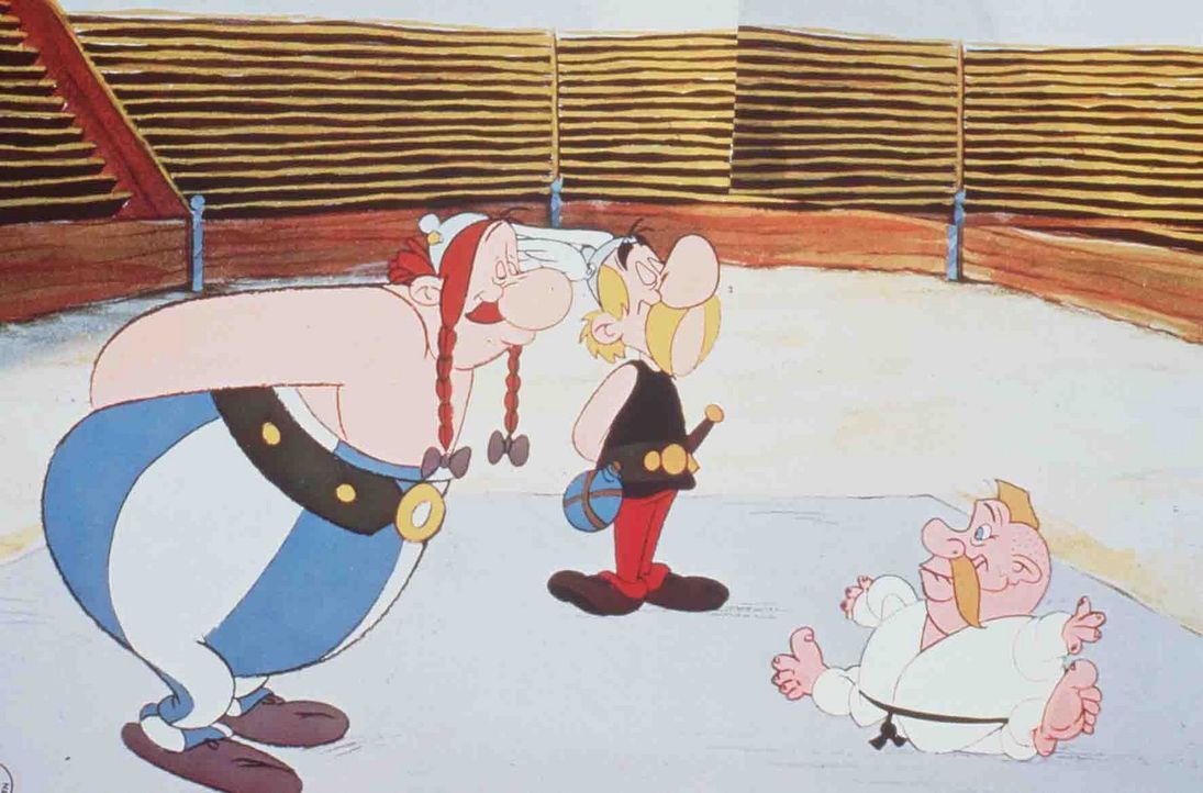 Cäsar stellt Asterix (M.) und Obelix (l.) zwölf Prüfungen, und eine davon ist, gegen den germanischen Judomeister (r.) zu kämpfen. Ob sie eine Chanc... - Bildquelle: Jugendfilm-Verleih GmbH