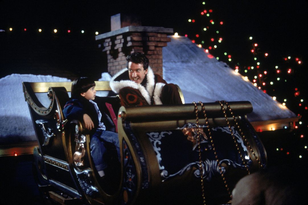 Als sein Vater Scott (Tim Allen, r.) sich endlich bereit erklärt, den Job als Santa Claus anzunehmen, ist der kleine Charlie (Eric Lloyd, l.) das g... - Bildquelle: Buena Vista Pictures
