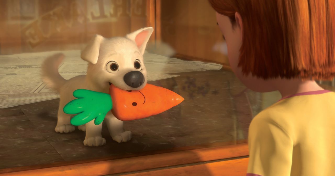 Liebe auf den ersten Blick: Die kleine Penny (r.) ist von dem süßen Hund (l.) sofort angetan. Sie tauft ihn auf den Namen "Bolt" und die beiden si... - Bildquelle: Disney Enterprises, Inc.  All rights reserved